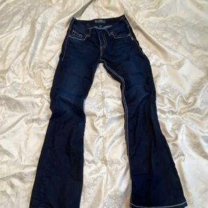 Women’s silver jeans 27/32 broke zipper but never worn